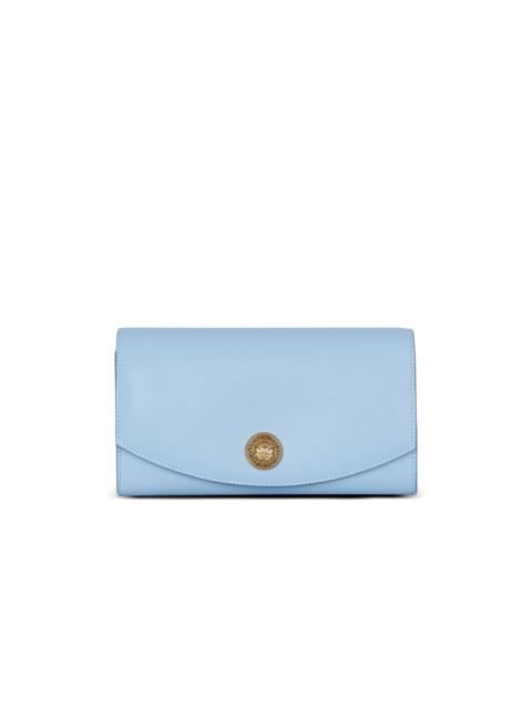 Emblème grained calfskin clutch