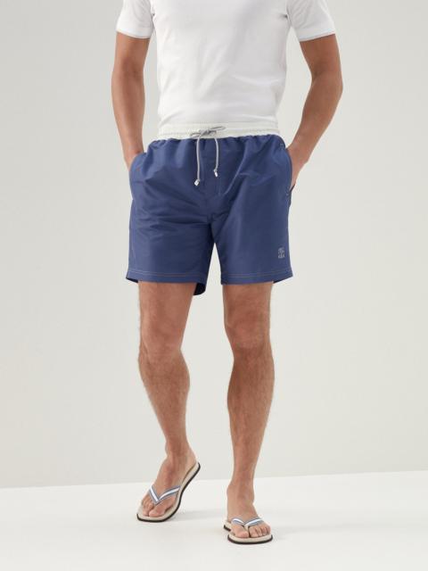 Swim shorts with contrast details
