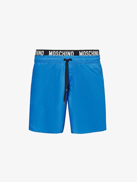 Branded-waistband slip-pocket swim shorts