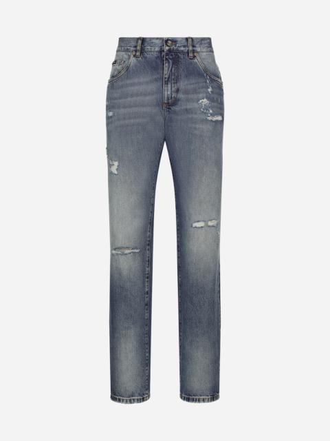 Classic blue denim jeans with abrasions