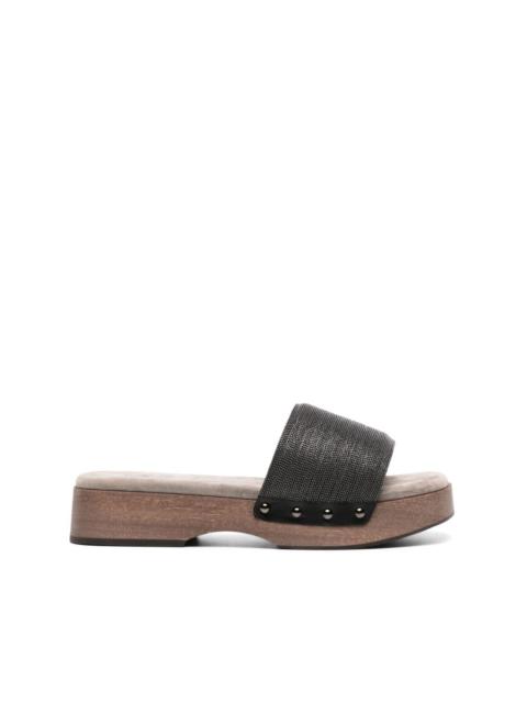 Monili-embellished wooden slides