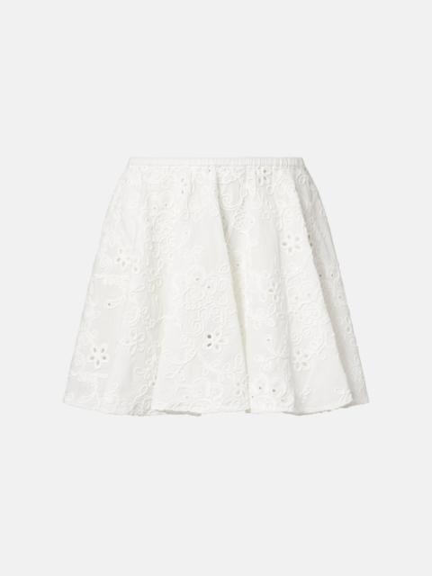 NORMA KAMALI Broderie anglaise cotton miniskirt