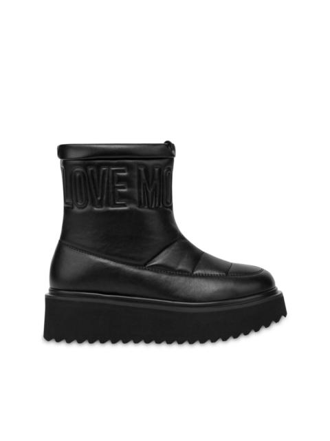 Moschino logo-embroidered flatform boots
