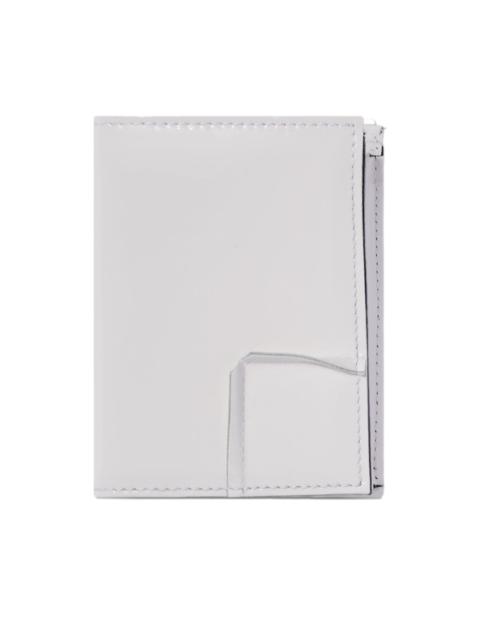 Comme Des Garçons leather wallet