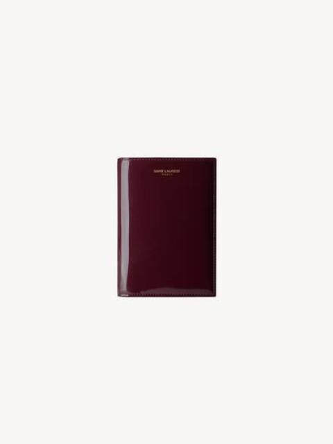 SAINT LAURENT SAINT LAURENT PARIS PASSPORT CASE IN PATENT LEATHER