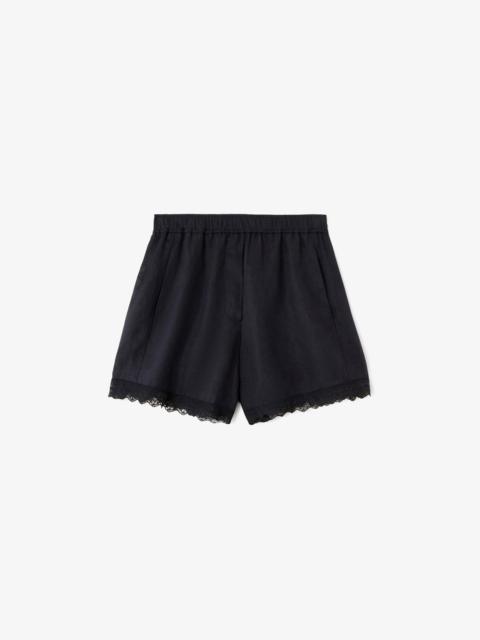 GANNI SHORTS IN BLACK LINEN