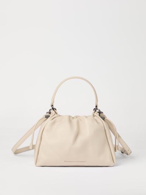 Brunello Cucinelli Mellow small bucket bag in soft leather with monili