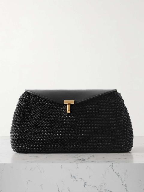 Totême T-Lock woven leather clutch Black