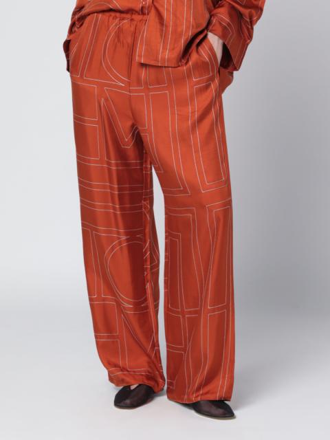 TOTEME Monogram Silk Pajama Trousers in Terracotta