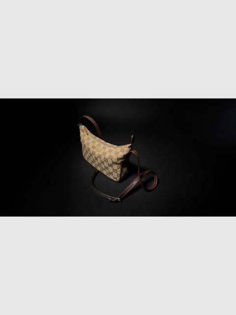 GUCCI Small shoulder bag with Gucci plaque