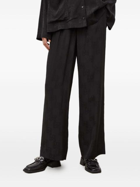 HERSKIND monogram-pattern trousers