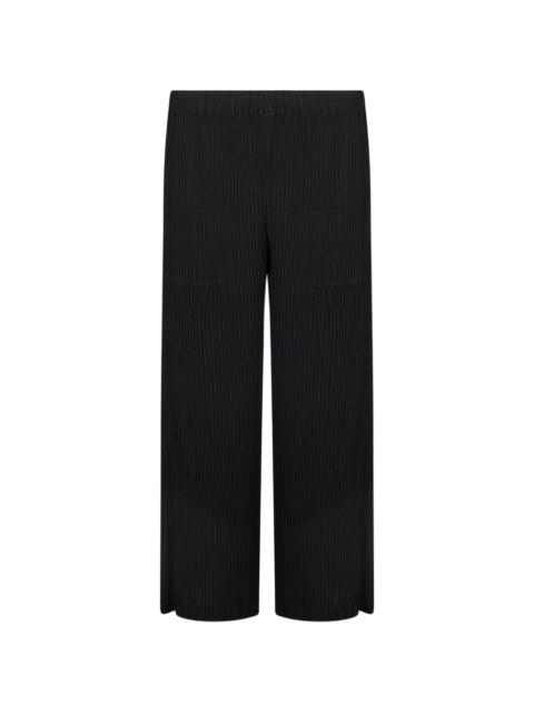 ISSEY MIYAKE Hatching pleated wide-leg trousers