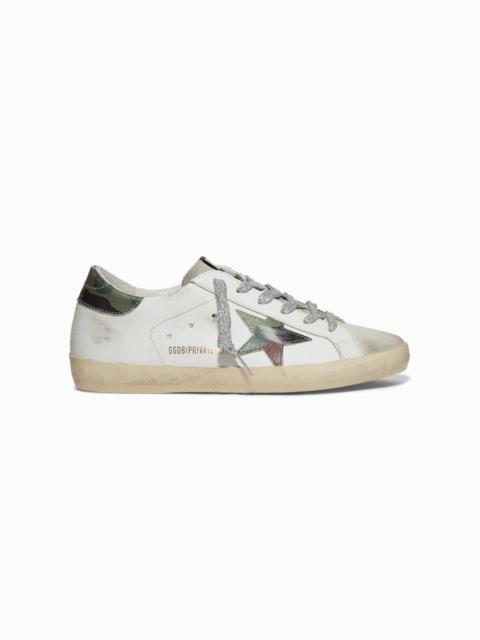 Superstar distressed printed leather and suede sneakers