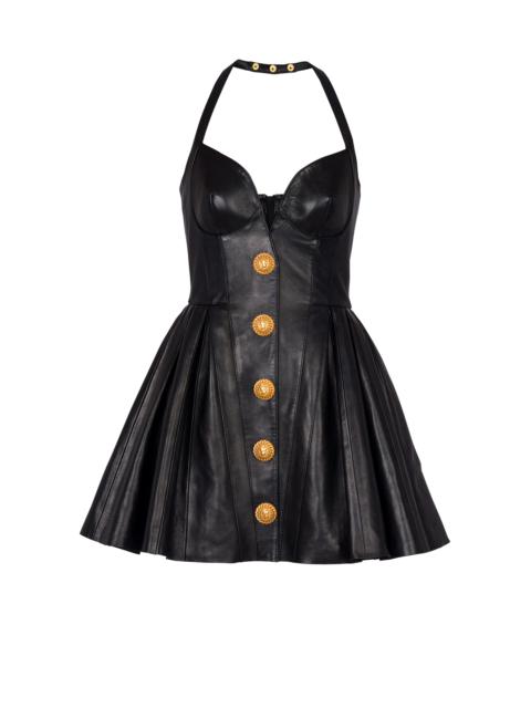 Flared pleated halterneck dress in leather