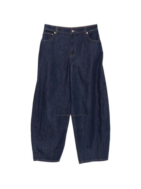 SIMKHAI contrast-stitch wide-leg jeans