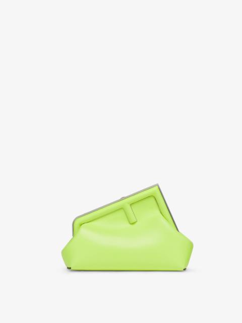 FENDI Small Fendi First bag made of soft, neon yellow nappa leather with oversized metal F clasp bound in 