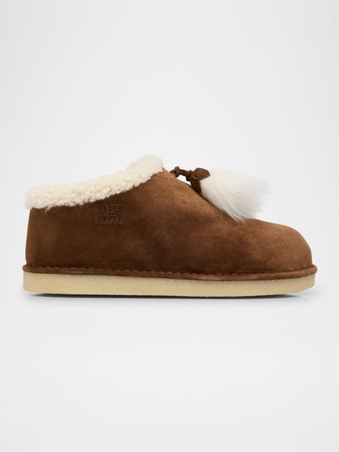 Miu Miu Suede Shearling-Lined Booties with Fur Tassels
