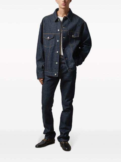 GUCCI GG-embossed straight-leg jeans