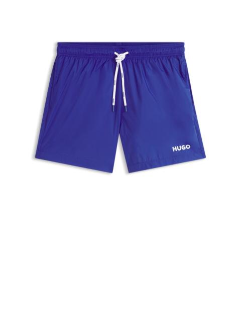 HUGO SWIM SHORTS WITH CONTRAST LOGO PRINT