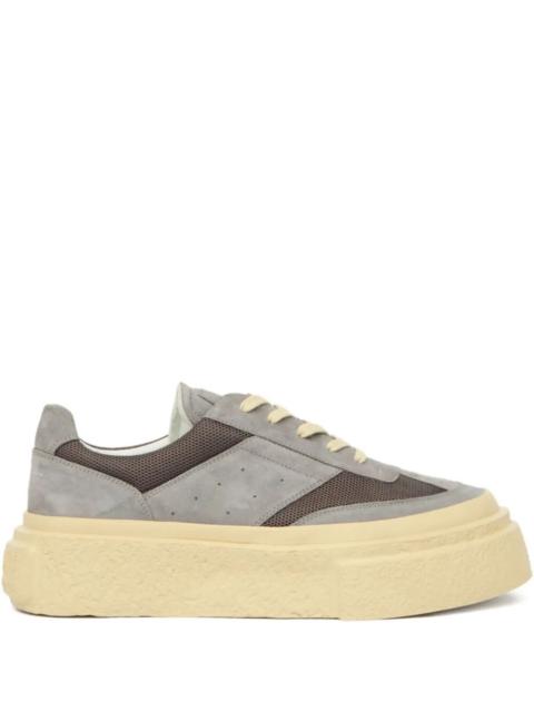 MM6 Maison Margiela Introducing the SNEAKERS by MM6, a striking addition to the footwear category. Crafted from premium 
