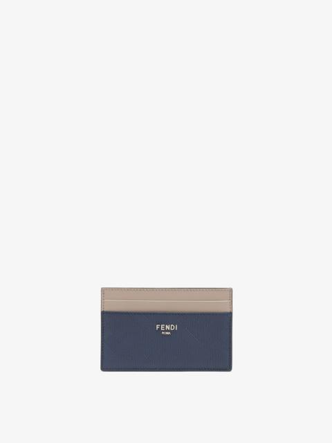 FENDI Blue leather card holder with FF motif. Beige leather details. Palladium metal FENDI ROMA lettering.