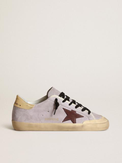 Super-Star in lilac suede with a brown star and gold heel tab