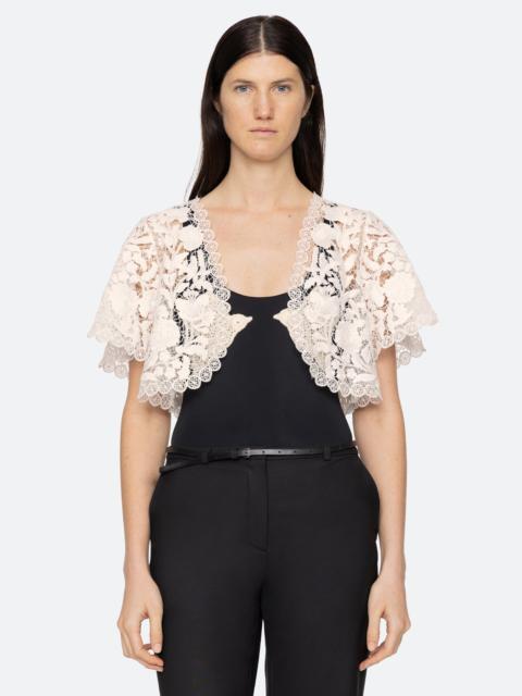 Sea Kira Shrug