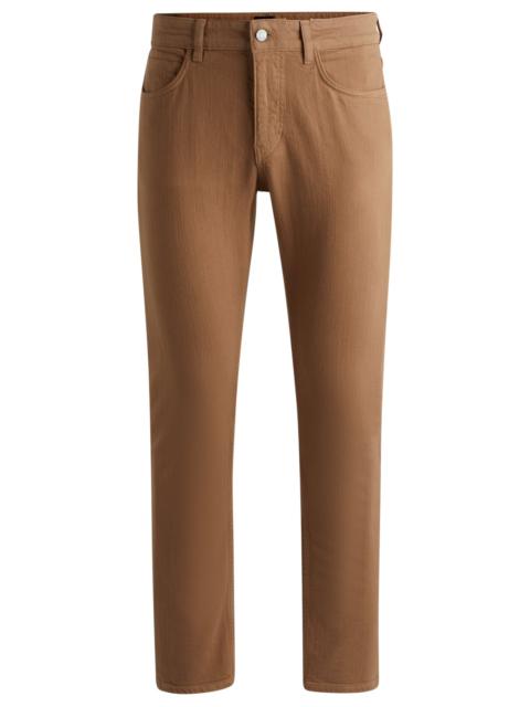 BOSS SLIM-FIT JEANS IN BLACK MECHANICAL-STRETCH DENIM