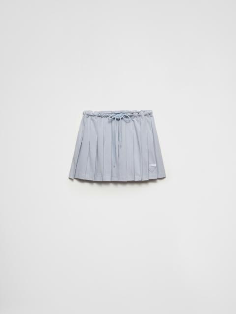 Pleated piqué miniskirt