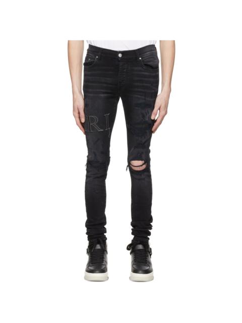 AMIRI logo-patch slim-fit jeans