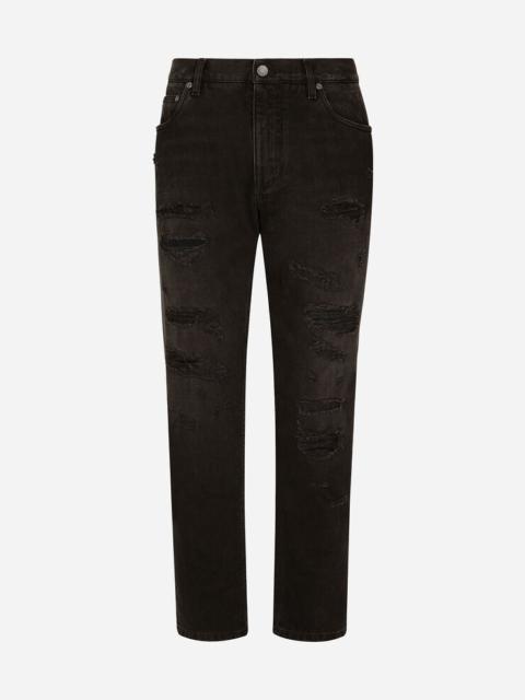 Loose black wash jeans with rips