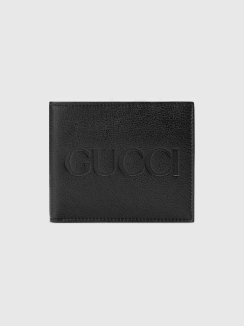 Wallet with embossed Gucci logo