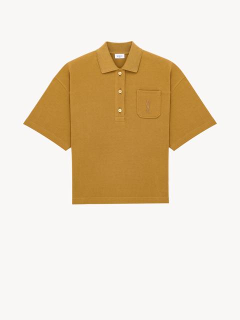 SAINT LAURENT CASSANDRE OVERSIZED POLO IN COTTON PIQUÉ