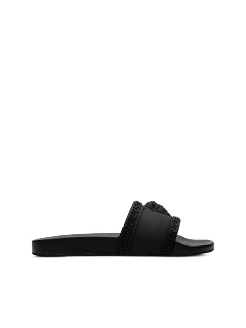 VERSACE Palazzo Medusa pool slides