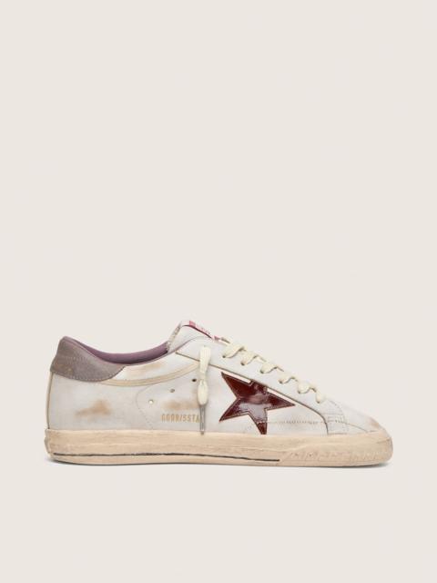Golden Goose Men’s Super-Star in white leather with burgundy laminated leather star