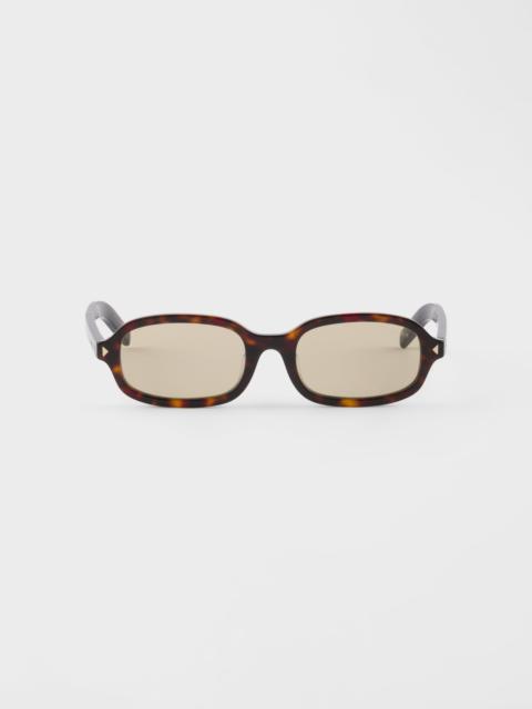 Prada Sunglasses with the iconic metal plaque