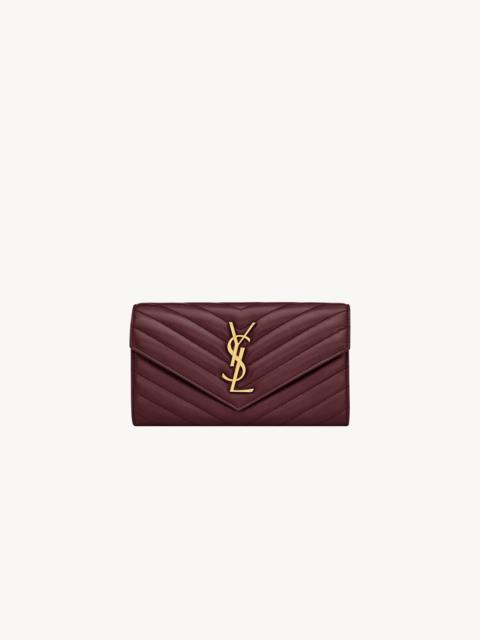 SAINT LAURENT CASSANDRE MATELASSÉ LARGE FLAP WALLET IN LAMBSKIN