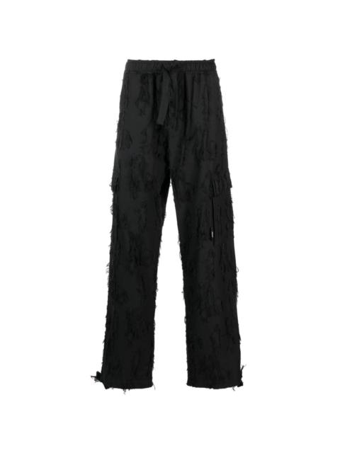 distressed-effect cotton trousers