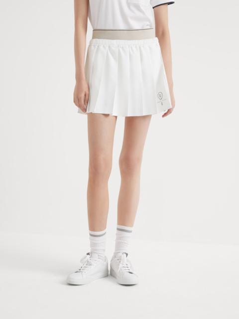 Pleated techno poplin mini skirt with tennis logo