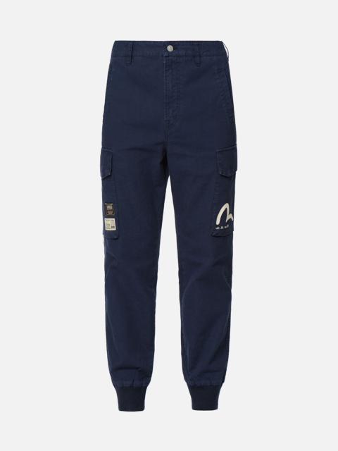 EVISU HIDE-AND-SEEK GODHEAD PRINT CARGO JOGGER PANTS