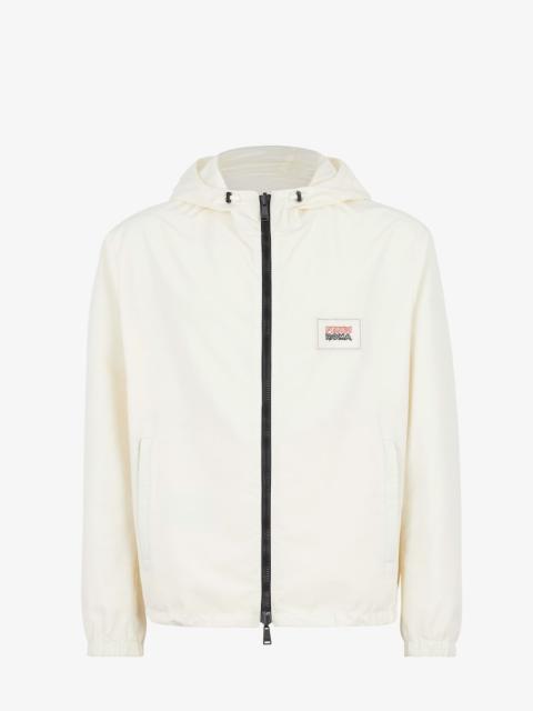 FENDI Windbreaker with drawstring hood and hem. Side pockets and stretch cuffs. Zipper closure. Made of wh