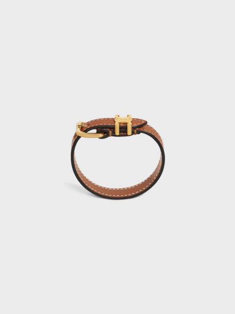 Triomphe Bracelet in Calfskin and Brass with Gold Finish