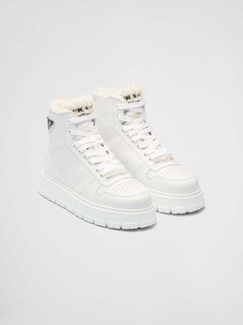 Prada Leather and shearling high-top sneakers