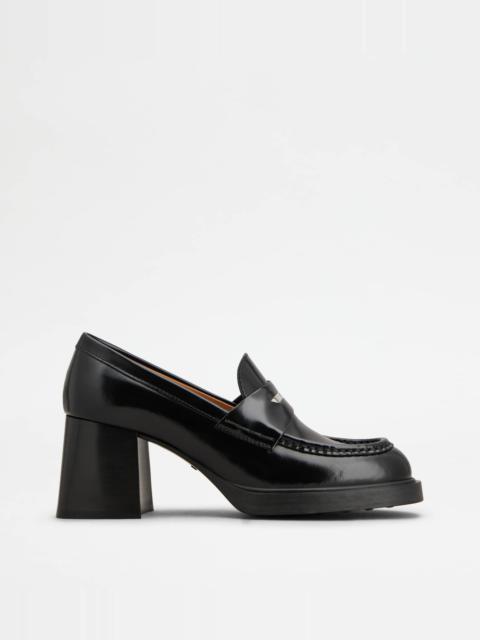 Tod's LOAFERS IN LEATHER WITH HEEL - BLACK