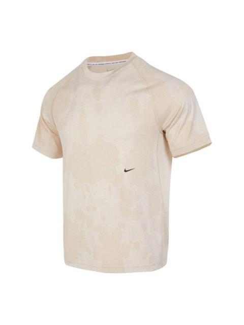 Nike Nike Dri-FIT ADV A.P.S. 설계 짧은 소매 피트니스 탑 '베이지' DX6955-126