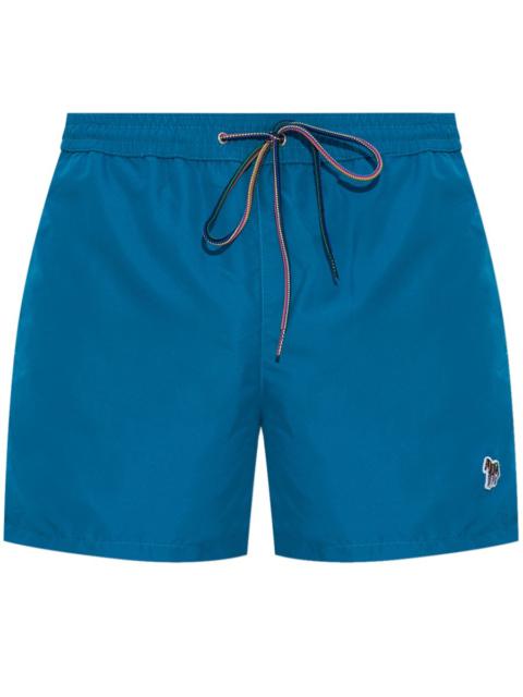 Swimming shorts with patch
