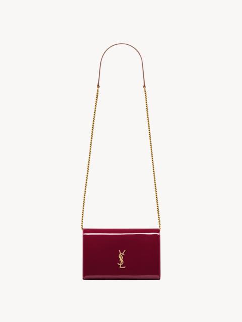 SAINT LAURENT CASSANDRE ENVELOPE CHAIN WALLET IN PATENT LEATHER