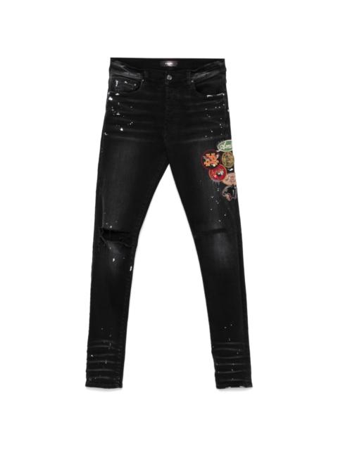 AMIRI patch-detailing skinny jeans