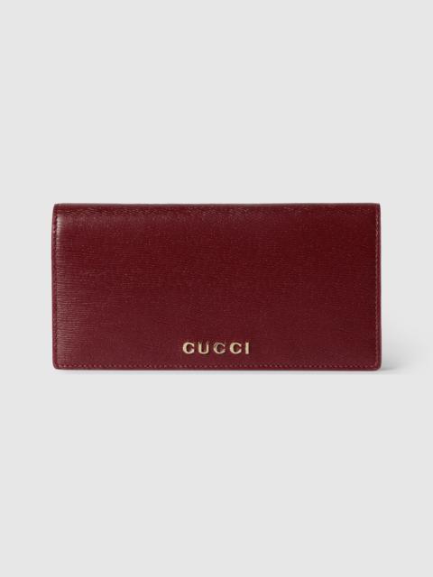 GUCCI Continental wallet with Gucci script
