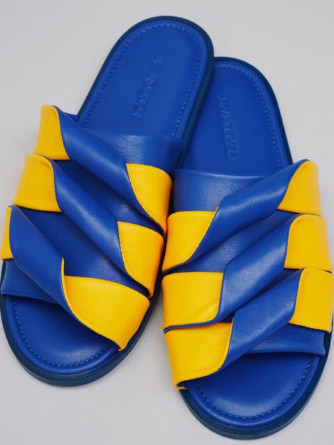 JW Anderson WOMENS CONTRASTING LEATHER COIL SLIDE IN BLUE & YELLOW